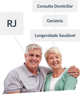 casal de idosos de roupa branca e verde